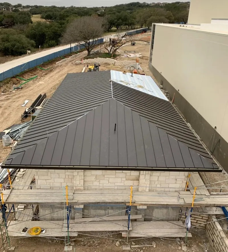 Metal roof new construction with scaffolding in Jonesborough